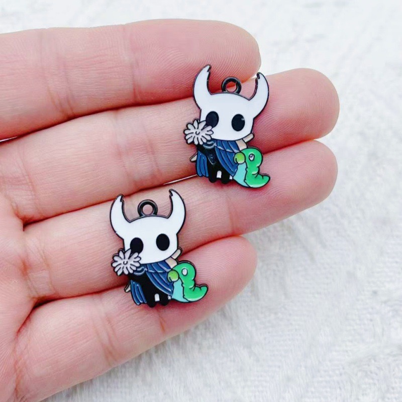 10pcs alloy drip oil cartoon a - مراجعة Party Games Crazy وسعره
